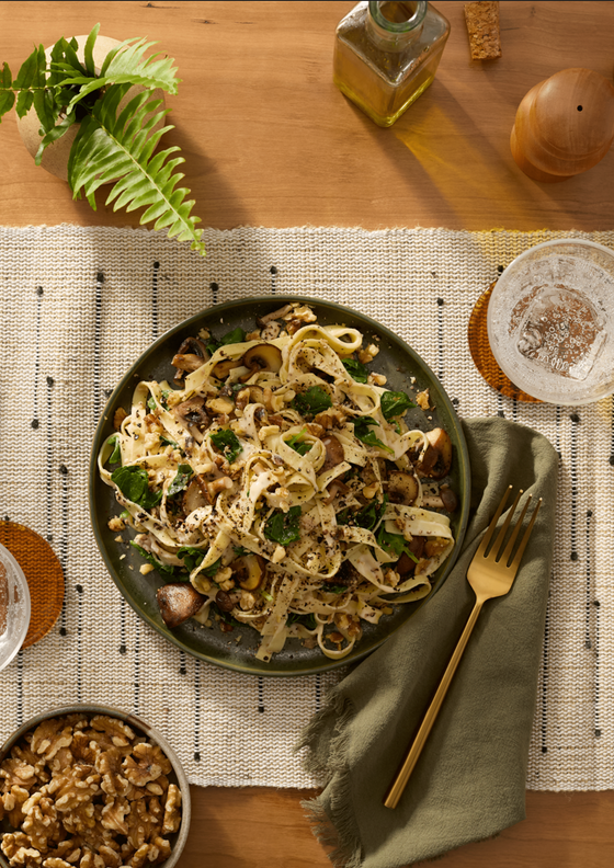 Fresh Fettuccine with Mushrooms, Greens, and Walnuts