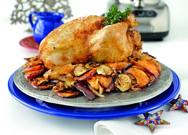 Roast chicken with macadamia, almond and orange stuffing