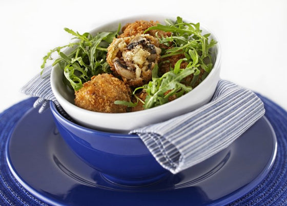 Golden breaded mushroom medley risotto balls