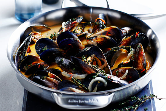 Wine, saffron and chilli infused mussels