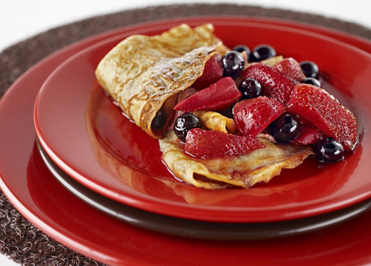 Lacey crepes with a Frangelico berry sauce