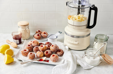 Lemon scented strawberry jam doughnuts