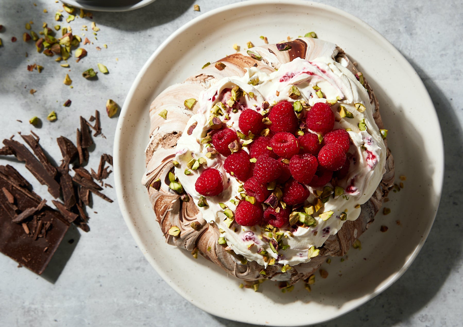 Chocolate and pistachio pavlova