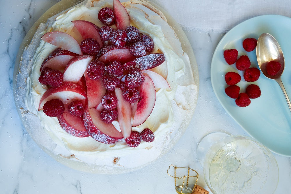 White peach, raspberry and mascarpone pavlova