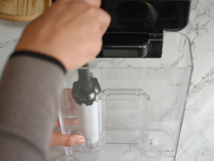 Place water filter and test water hardness